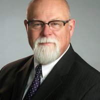 Profile photo of Hon. Eric Watness (Ret.)